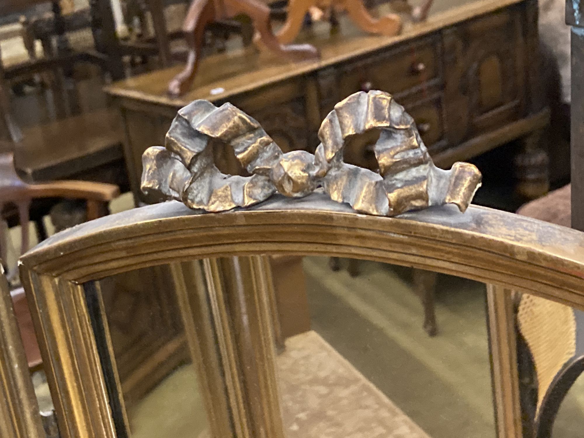A giltwood and gesso triple folding dressing table mirror, width 106cm, height 78cm